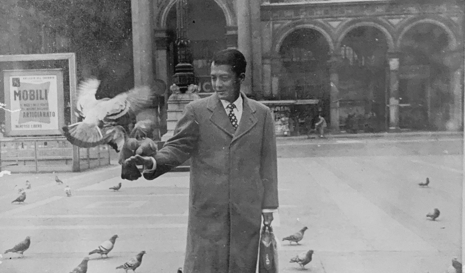 Hadji feeding the pigeons at the Piazza del Duomo, Milan
