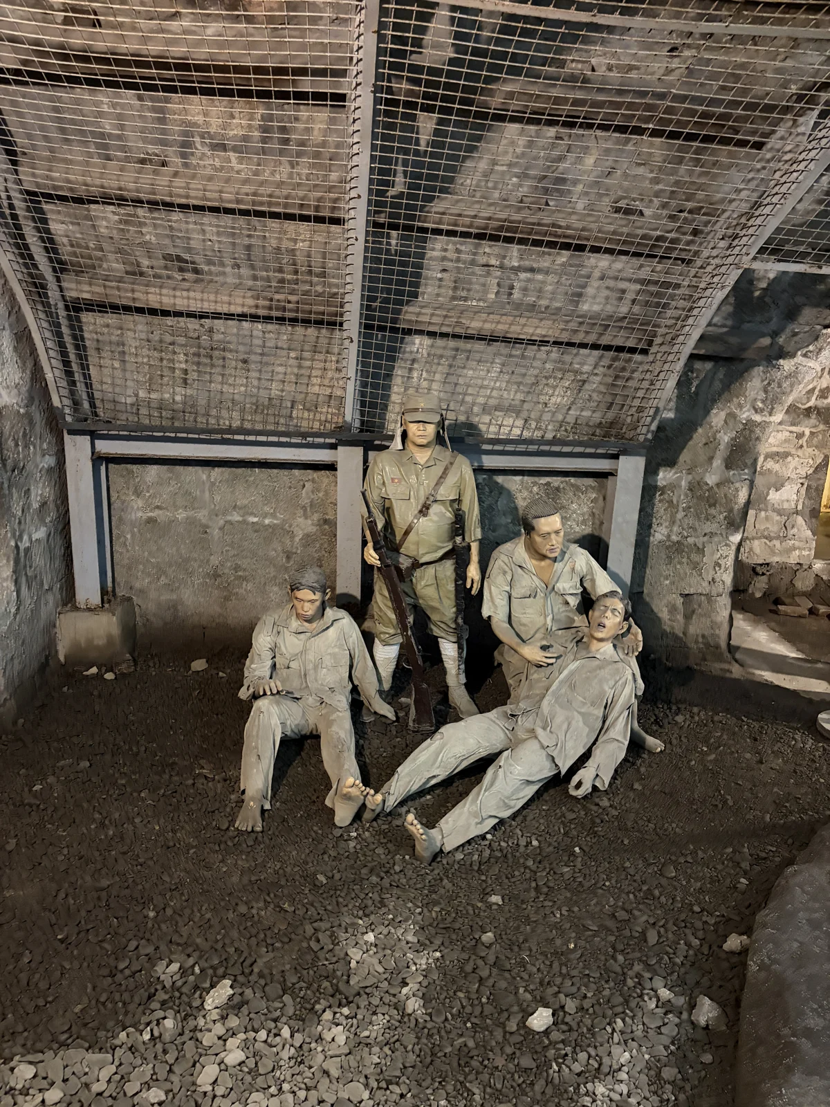 Diorama of a guard over prisoners in the Fort Santiago dungeons