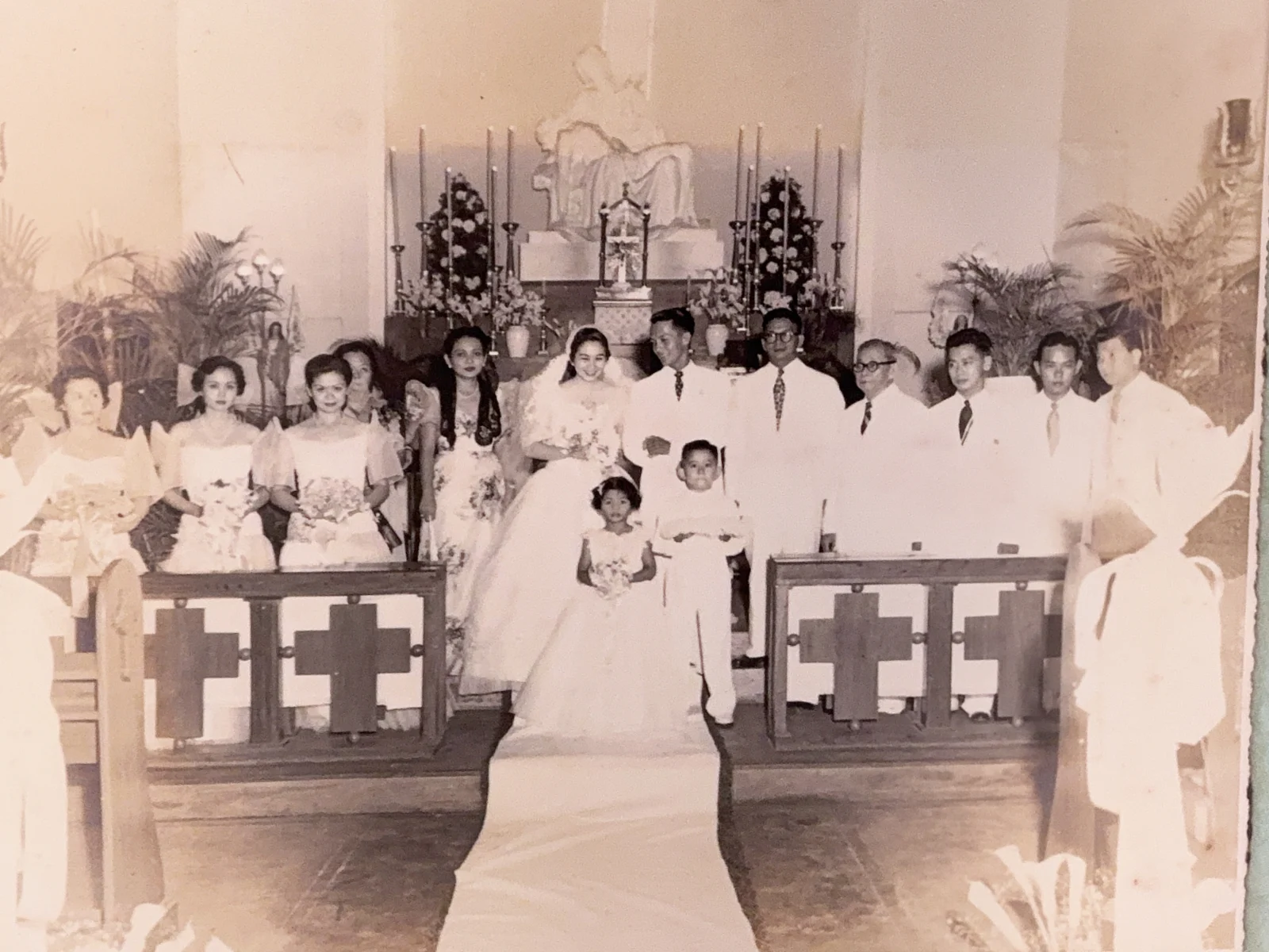 The couple with their wedding entourage